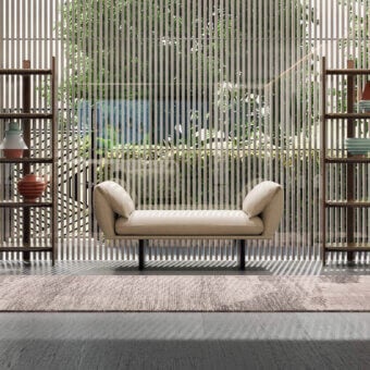 Refined Borzalino Connor Bench ottoman with full padding and a sleek sled base in dark-toned metal finish