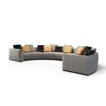 Sophisticated Borzalino Franklin U sectional upholstered in neutral gray textile with dark-toned wood base and accent pillows