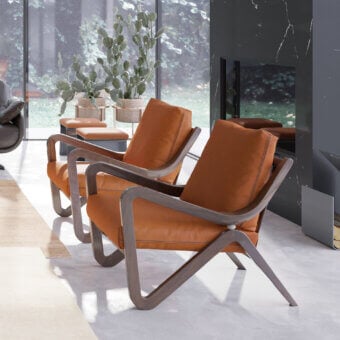 Lavish Borzalino Taylor armchair with vibrant orange textile upholstery and lacquered canaletto walnut finish