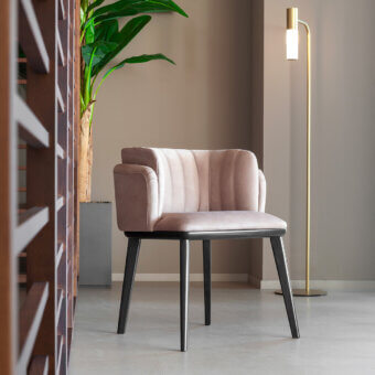 Elegant Carpanese Home Annette armchair upholstered in rose textile with solid beech wood legs crafted in Italy