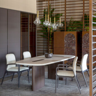 Exceptional Carpanese Home Birkin armchair crafted in solid ash wood with satin finish and creamy off-white upholstery