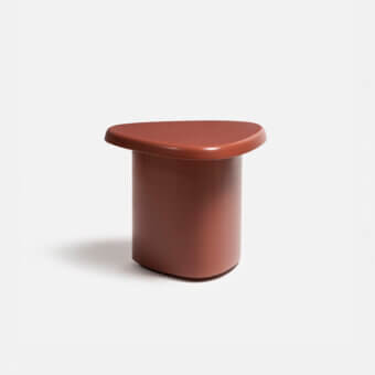 Superior Carpanese Home Bitt side table with terracotta tabletop and smooth matte synthetic material build