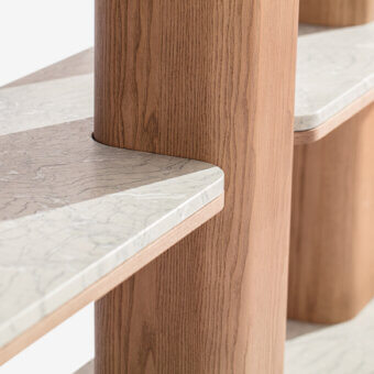 Distinguished Carpanese Home Erice L bookcase crafted with solid ash wood and beveled marble in a warm brown finish
