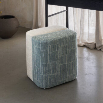 Exceptional Carpanese Home Rocha ottoman crafted with muted blue-green striped textile and a contrasting beige base band