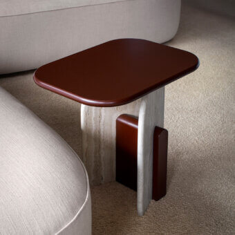Distinguished Carpanese Home Slabs side table crafted in reddish-brown wood with a stone-like composite base and glossy finish