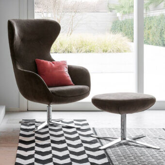 Exceptional Dallagnese Madame lounge chair upholstered in brownish-gray woven textile with polished chrome-plated steel swivel base