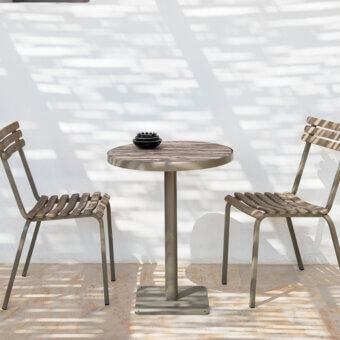 Superior Ethimo Laren Bistrot table with medium-toned brown wooden tabletop and satin gray metal base crafted with a matte finish