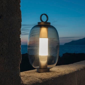 Exclusive Ethimo Lucerna lamp crafted in muted amber glass and metal with a satin finish