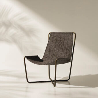 Exceptional Ethimo Sling lounge chair with dark gray woven textile and sleek dark matte metal frame