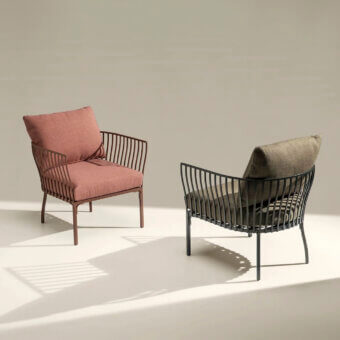 Distinguished Ethimo Venexia lounge chair with rose-gold aluminum slats and comfortable pink cushion construction