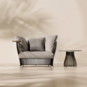 Superior Ethimo Venexia lounge chair crafted in Italy with slender aluminum slats and smooth wood arm accents in light gray textiles