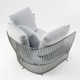Captivating Ethimo Venexia lounge chair with aluminum slats and textured gray cushions in a matte light gray finish