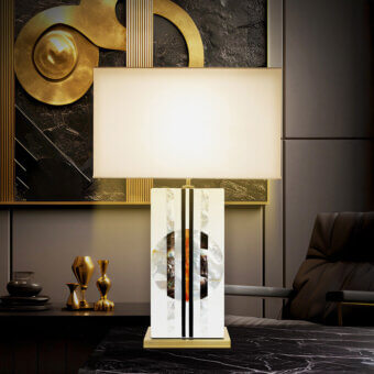 Lavish Laudarte Rock Table Lamp crafted in brass with a hand-assembled mosaic of stone and mother of pearl with a polished gold-toned base