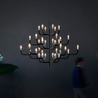 Exceptional Luceplan J-Us XL chandelier crafted in metal with a matte black finish and radiating warm white LED light sources