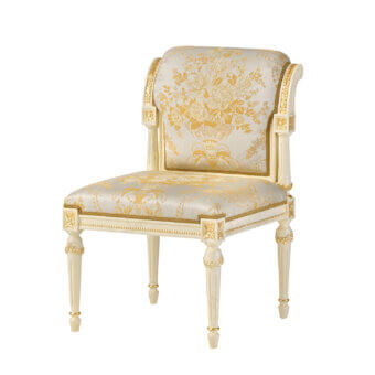Superior Modenese Golden Radiance chair crafted in ivory wood with hand-applied gold detailing and light grey floral fabric upholstery