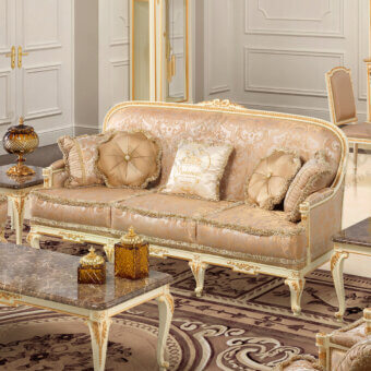 Lavish Modenese Midnight Moon sofa with cream and gold fabric upholstery and exquisite gold leaf accents