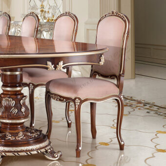 Exquisite Modenese Noble Etiquette chair in pale pinkish-beige textile with skilled carvings and glossy wood finish