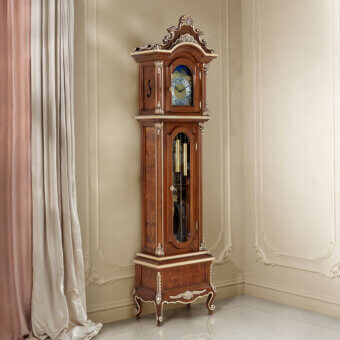 Distinguished Modenese Noble Etiquette grandfather clock crafted in warm brown polished wood with ornate carved floral detailing