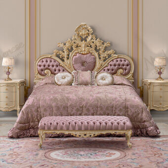 Exquisite Modenese Pink upholstered royal bed handcrafted in pink satin with capitonné detailing and gilded accents