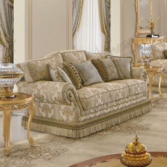 Distinguished Modenese Royal Blend sofa upholstered in cream and gold patterned fabric with satin finish and tassel fringe