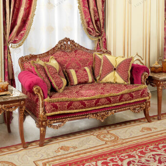 Distinguished Modenese Rubino Delight sofa upholstered in ruby-red damask with gold embroidery and a walnut finished hand-carved wooden frame