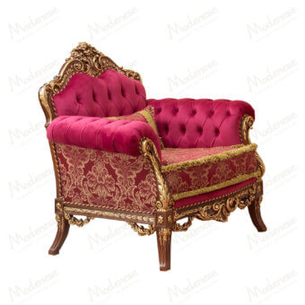 Sumptuous Modenese Rubino Delight lounge chair upholstered in ruby-red velvet with gilded hand-carved wooden frame
