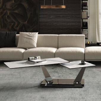 Distinguished Naos Aquilyps coffee table crafted with synchronized revolving clear glass tops and dark-toned galvanized steel base