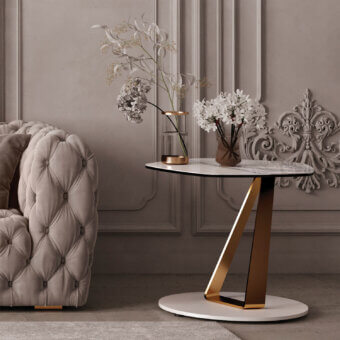 Distinguished Naos Basalto side table with glossy white ceramic stone tabletop and satin galvanized angled structure