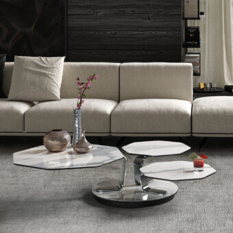 Distinguished Naos Batis coffee table with polished grey veined marble and curved chrome-colored metal base