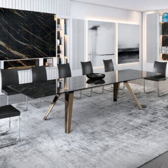 Distinguished Naos Equus extendable table with expansive glass tabletop and polished chrome metal base