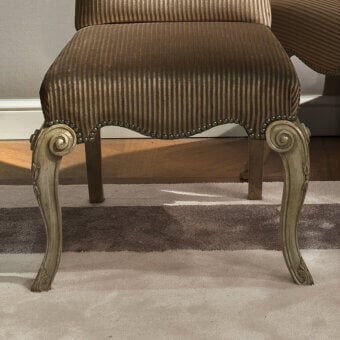 Lavish Provasi 1104 chair with vertically ribbed gold and brown textiles and a slightly distressed wooden frame