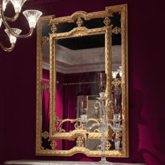 Distinguished Provasi 1107 mirror crafted in Italy with wooden frame and reflective glass panel in antique gold light patina