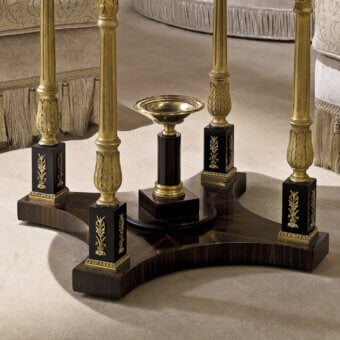 Lavish Provasi 1228 side table with ebony basement, rhythmic carved legs treated with gold light patina, and sleek glass tabletop