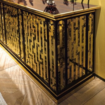 Architectural Provasi 1402 sideboard crafted in Italy with dramatic Ebony wood and lustrous gold-toned metal grid detailing