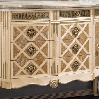 Distinguished Provasi 1505 dresser crafted in maple with a light beige finish and ornate gold accents atop marble