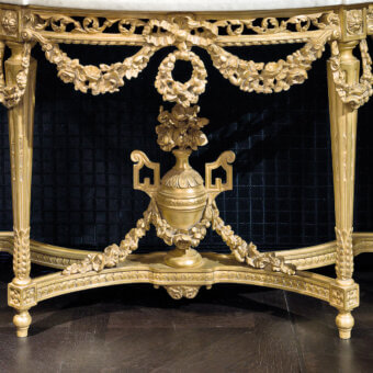 Distinguished Provasi 2822 console crafted in Italy with sculpted floral motifs and a brilliant gold finish over wood with marble
