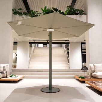 Superior Royal Botania Anamon sunshade crafted in matte gray metal with smooth off-white textile offering elegant shade and warm white illumination