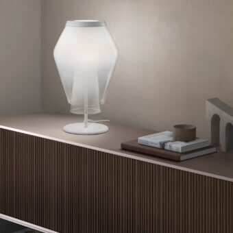 Luxury Vistosi Anisette table lamp crafted in milky glass with slender form and subtle fluted detailing