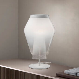 Distinguished Vistosi Anisette table lamp crafted in translucent milky glass with a smooth satin finish