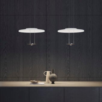 Elegant Vistosi Dione suspension lamp crafted in Italy with overlapping glass discs and a brushed silver-toned metallic core with matte white finish