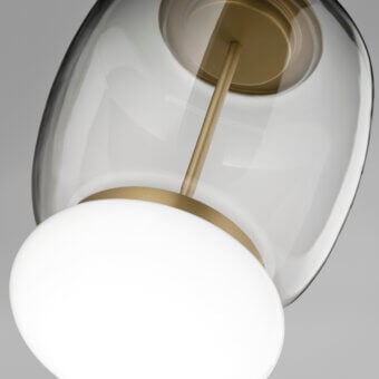 Elegant Vistosi Faro suspension lamp crafted in hand-blown glass with clear to smoky gray gradient and satin gold metal ring