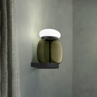 Distinguished Vistosi Faro wall lamp crafted in transparent colored glass with glossy white diffuser and matte black finish