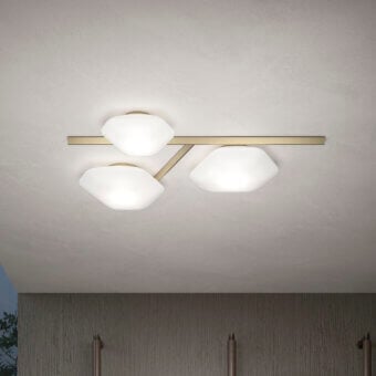 Distinguished Vistosi Modulor ceiling lamp with opaque white glass globes and a satin brass-toned metal bar