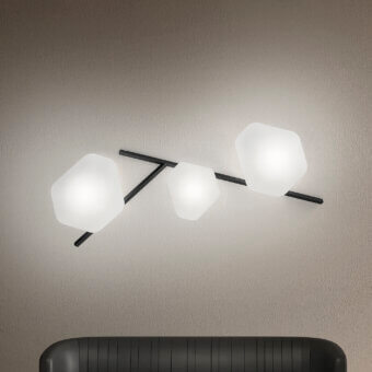 Superior Vistosi Modulor wall lamp crafted in Italy with beveled glass and a matte black frame for elegant illumination
