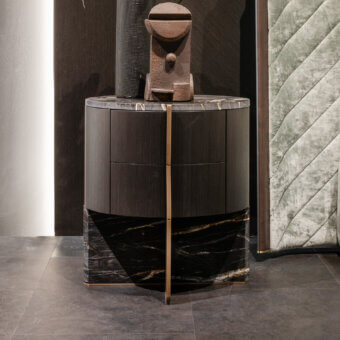 Elegant Zanaboni Adam nightstand with striped gray wood and cool marble, crafted with cloudy gold detailing