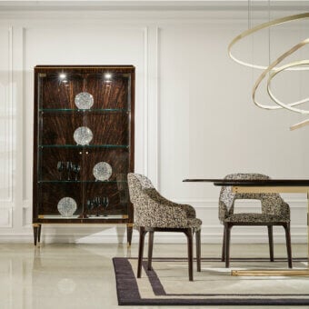 Elegant Zanaboni Addison armchair crafted in Italy with walnut-stained ash wood and mottled beige-brown textile upholstery