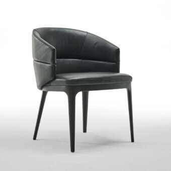 Superior Zanaboni Alma armchair upholstered in smooth black leather with a sophisticated ash wood base