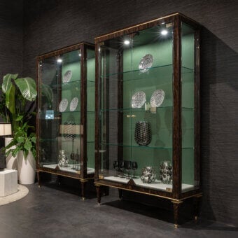 Distinguished Zanaboni B/5410 showcase crafted in exotic palm wood with luminous brass accents and a glossy finish