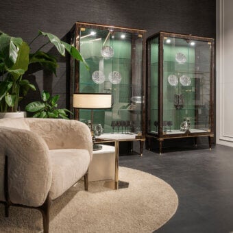 Captivating Zanaboni B/5410 showcase built in exotic palm wood with architectural brass and precious marble details, exhibiting a dark sheen