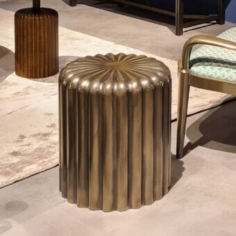 Distinguished Zanaboni Babylon ottoman with casted metal, vertical fluting and an oxidized bronze finish